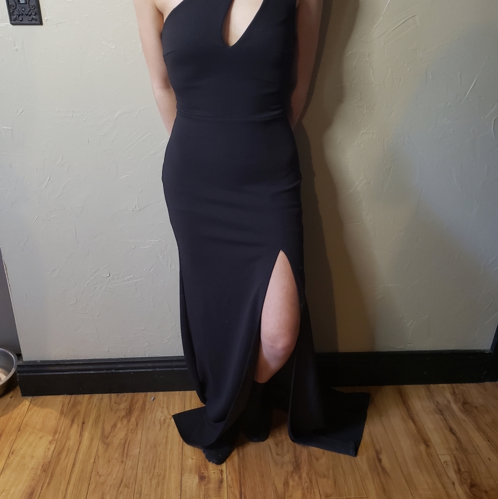B Darlin, stunning black,  asymmetrical, floor length dress with slit. Size 0.